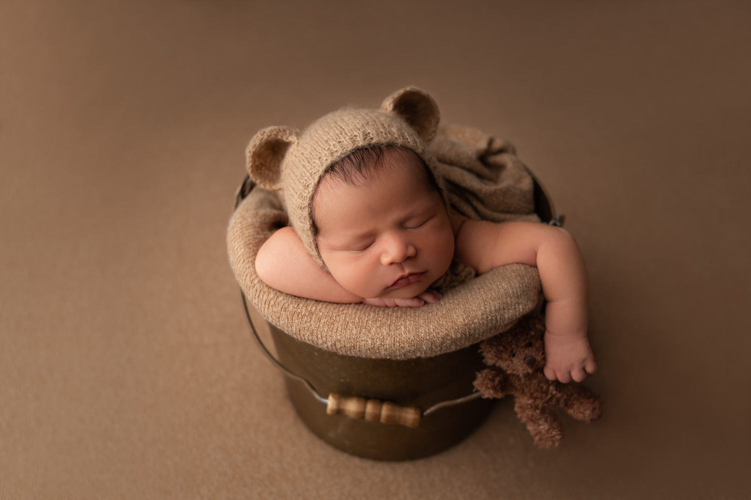 baby boy in bucket holding teddy bear in hollywood, fl