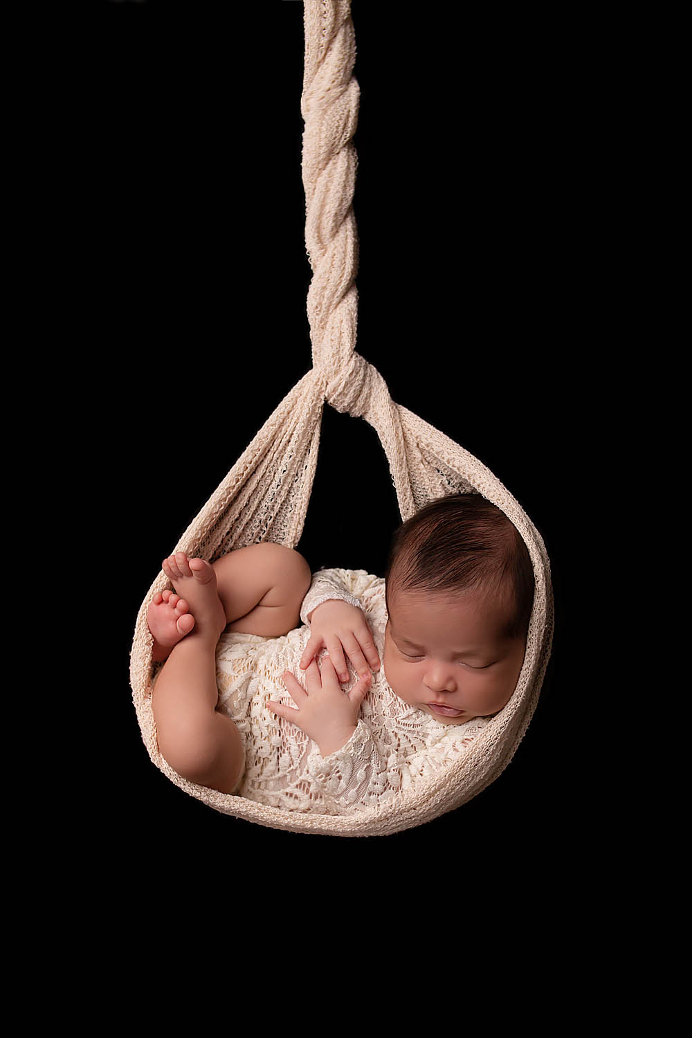 newborn baby girl in hanging pose in miramar, fl