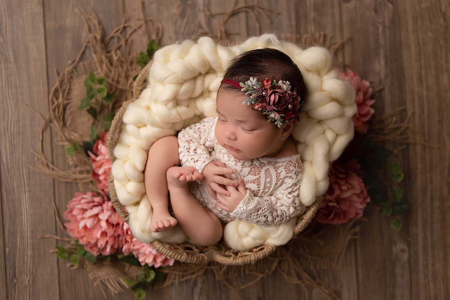 newborn baby girl photographed in basket in fort lauderdale, fl