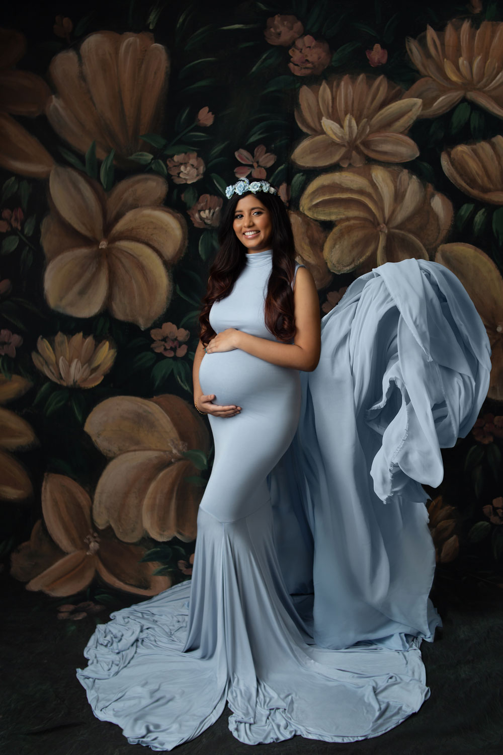 pregnant woman wearing a blue maternity dress1