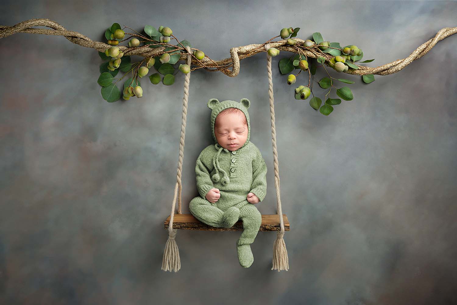 baby on swing for newborn photos in cooper city, FL