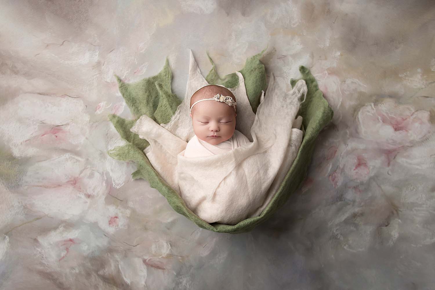 baby wrapped in a flower for newborn photography in weston, fl near ft. lauderdale, fl