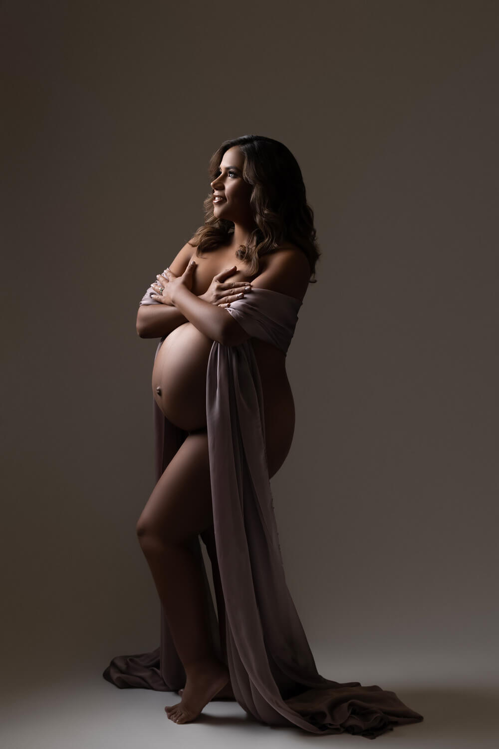 pregnant woman posed for maternity photoshoot